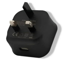 Black USB phone charger adapter with plug pins and charging port