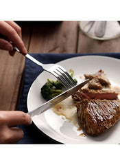 Huitich 6 piece knife set for dining cutting steak on white plate with broccoli
