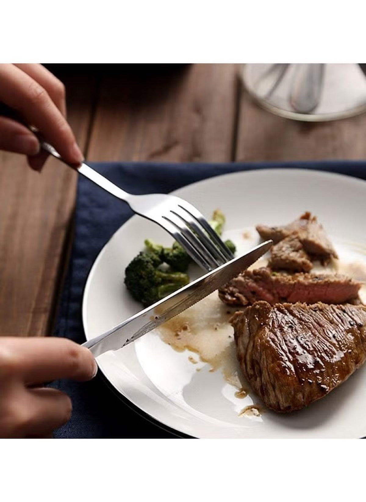 Huitich 6 piece knife set for dining cutting steak on white plate with broccoli