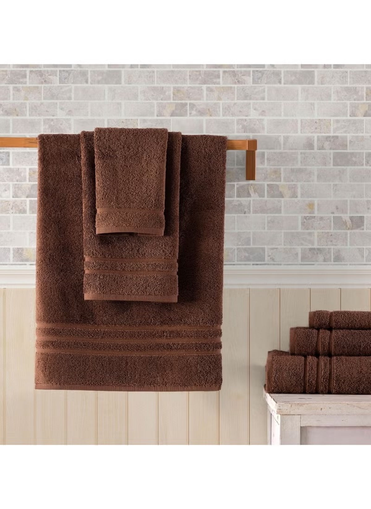 Huitich 6 piece towel set in rich brown color displayed on wooden rack and folded on shelf