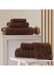 Huitich 6 piece towel set in rich brown color with soft, absorbent fabric neatly folded on white furniture