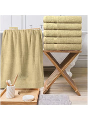 Huitich beige 6 piece towel set with six folded towels and one hanging in bathroom