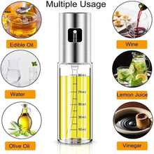 Stainless oil spray bottle with clear body, black dispenser nozzle and yellow oil
