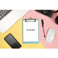 Light teal small plastic clipboard with metal clip, blank writing surface.