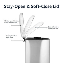 Stainless steel trash can with stay-open lid, black inner bin, and foot pedal