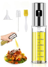 Stainless oil spray bottle with yellow oil and measurement scale, black nozzle