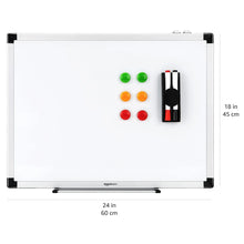 Magnetic whiteboard with colorful magnets and pen holder, white writing surface