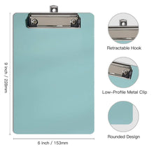Small light teal plastic clipboard with metal clip, includes size markings and rounded design.