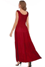 Red sleeveless tiered maxi dress from the back with gathered yoke