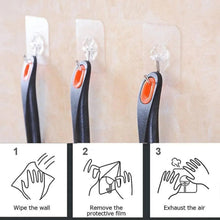 Transparent adhesive wall hook with chrome metal S hook, press on and exhaust air icon
