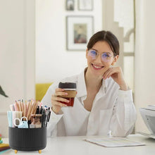 360-degree rotating desk organizer with ribbed black cup and pens and markers inside