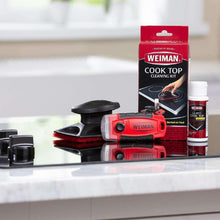 Weiman cook top cleaning kit with red-and-black scrubber, cleaner bottle, and pad