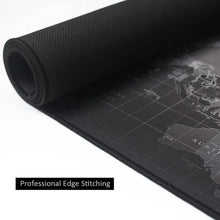 Rolled black world map gaming mouse pad with stitched edge and smooth surface