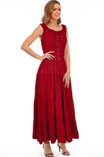 Red sleeveless tiered maxi dress with gathered bodice and flowing skirt