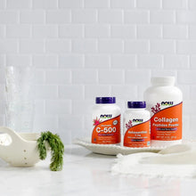 NOW Astaxanthin 4 mg supplement bottle and other NOW supplements on a tray