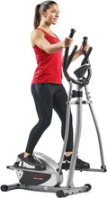 Magnetic elliptical trainer with pulse-rate grips and front foot pedals