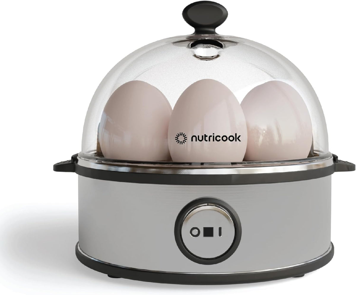طباخ البيض السريع NutriCook: طباخ بيض كهربائي بسعة 7 بيضات للبيض المسلوق أو البيض المسلوق أو البيض المخفوق أو العجة مع خاصية الإيقاف التلقائي - فضي