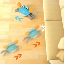 Blue electric crab toy crawling with obstacle-avoidance motion arrows