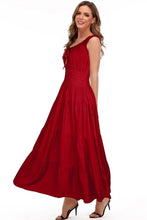 Red sleeveless tiered maxi dress with gathered skirt and smocked bodice