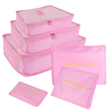 Pink travel packing cubes set with mesh panels and zipper closures