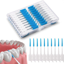 Interdental brush set with blue bristles and white handles in clear storage case