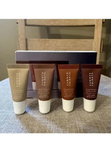 Mini lip butter balm set with four tubes in a display box, neutrals and dark tones