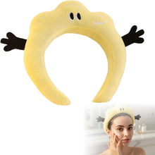 Yellow plush bunny-ear headband with floppy black bows, for skincare and face washing