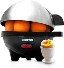 Electric egg cooker with stainless lid, black base, and egg poacher cup