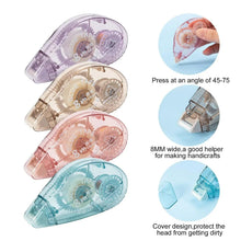 Assorted double sided tape applicator rolls in purple, beige, peach, and blue