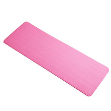 Pink yoga mat laid flat with textured grip finish