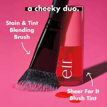 Blending brush with e.l.f. sheer lip and cheek tint bottle, plum-toned stain