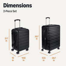 Two-piece black spinner luggage set with small and large hard-sided cases