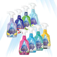 Assorted Astonish cleaning spray bottles, various colors, white triggers