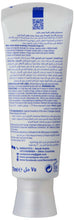 Toothpaste tube back label with directions and ingredient information in blue panel