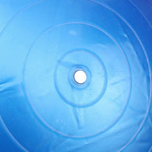 Blue anti-burst exercise ball close-up of the air valve