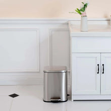 Brushed stainless steel small trash can with closed lid and foot pedal