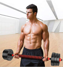 Adjustable dumbbells held with black plates and red-striped handles for strength training