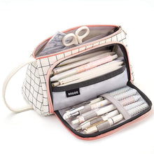 Canvas pencil storage bag, grid print exterior, zip-open compartments, pink edging, side handle