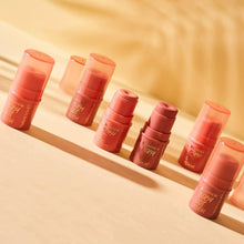 Row of Essence Baby got Blush pink balm containers on a display ledge