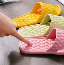 Yellow, white, and pink quilted slide shower slippers, open toe
