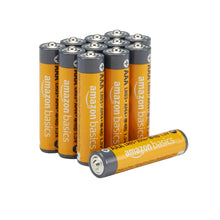 AAA alkaline batteries bundle, yellow and gray cylinders with plus signs
