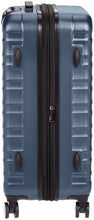 Navy polycarbonate spinner luggage back with zipper track and corner wheels