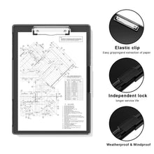 Black dry-erase clipboard holding a printed sheet; elastic clip and lock detail