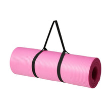 Pink yoga exercise mat roll with black carrying strap