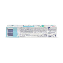 Toothpaste box back panel with barcode and ingredients directions text
