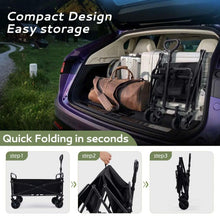 Black folding garden cart with fabric body and handle, parked inside a vehicle trunk