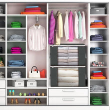 Clothes storage bag organizer in wardrobe, holding folded clothes, dark gray with handles