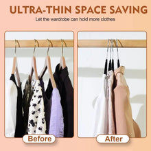 Black velvet clothes hangers hanging on a rail, space-saving slim design