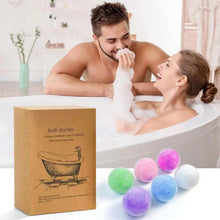 Bath bomb gift box with six pastel round bombs on a tub beside a couple