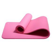 Pink yoga mat with rolled center and textured grip surface